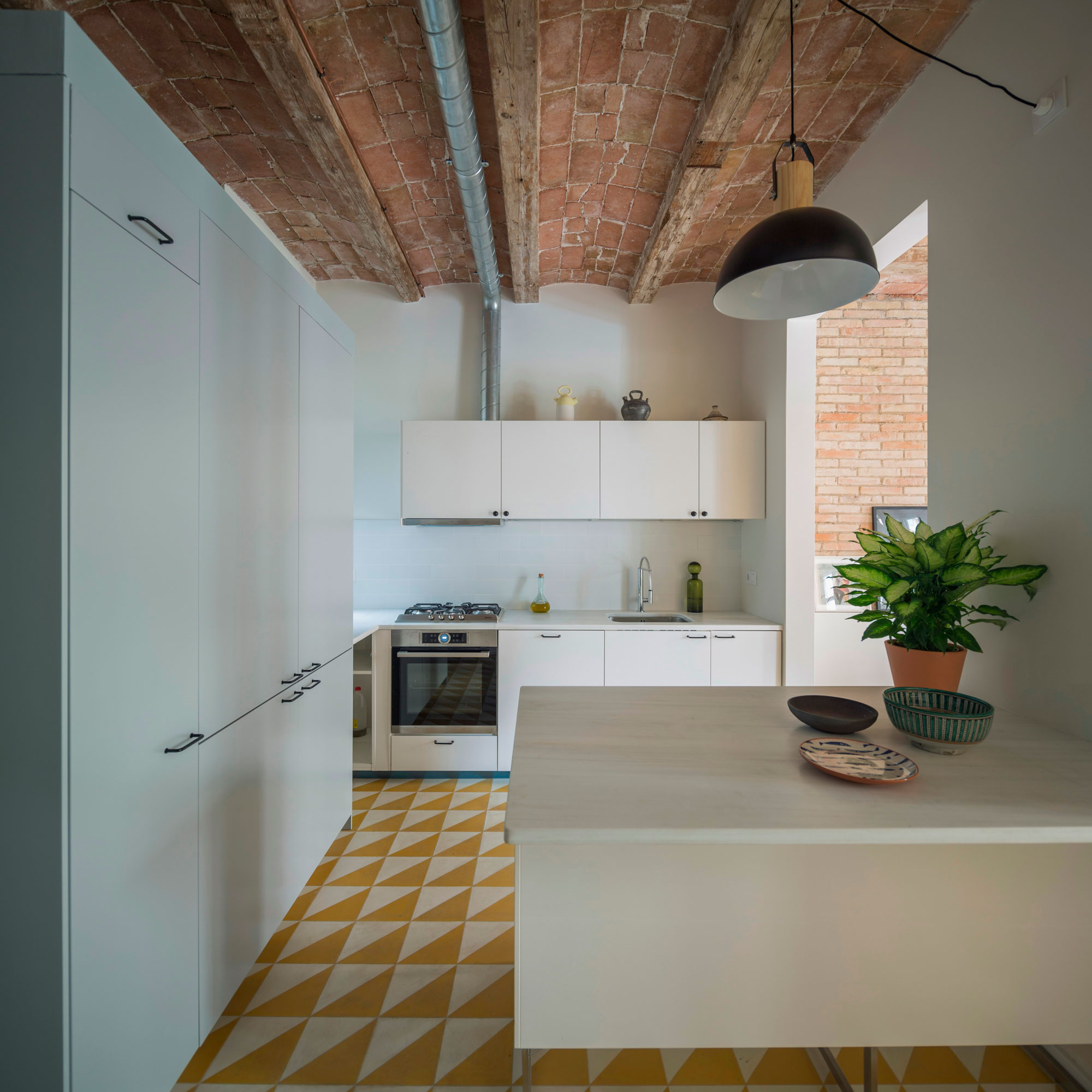 A Striking and Warm Apartment Drenched in Natural Light and Character in Barcelona, Spain by Nook Architects (9)