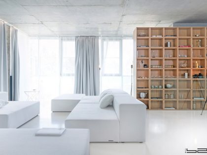 A Stylish Apartment with Concrete Walls and Glass Elements in Moscow, Russia