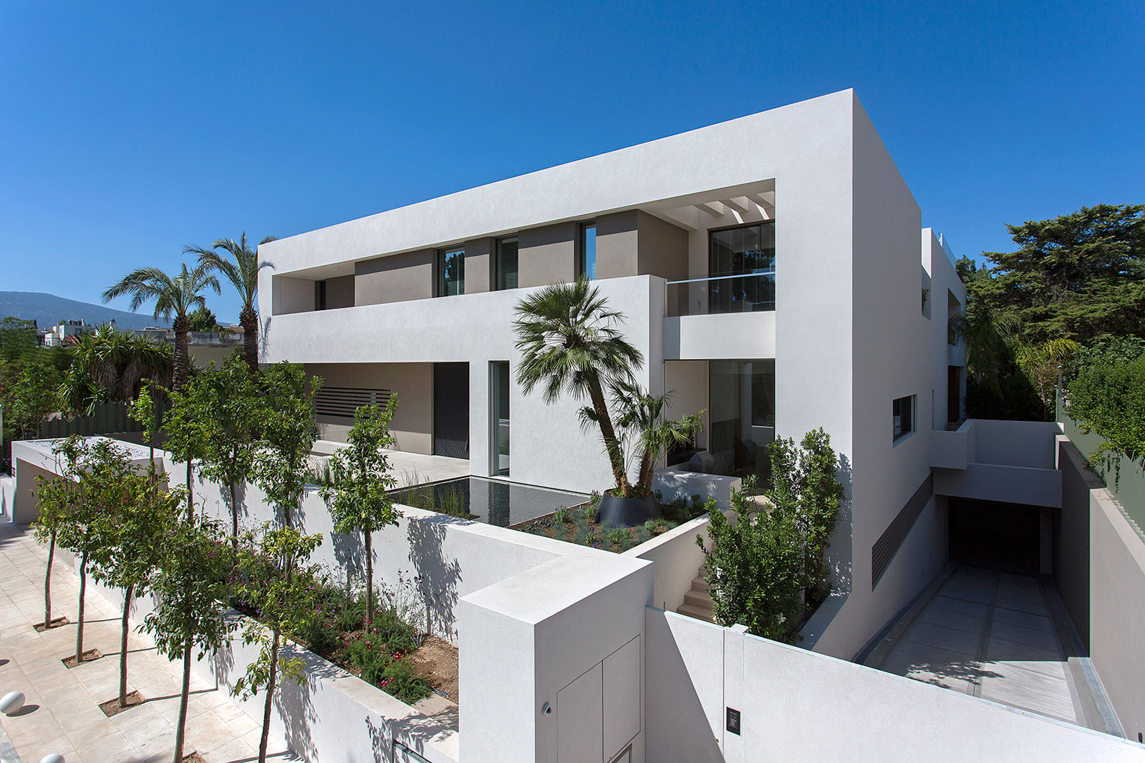 A Stylish Contemporary Home Drenched in Natural Light in Athens, Greece by Moustroufis Architects (1)