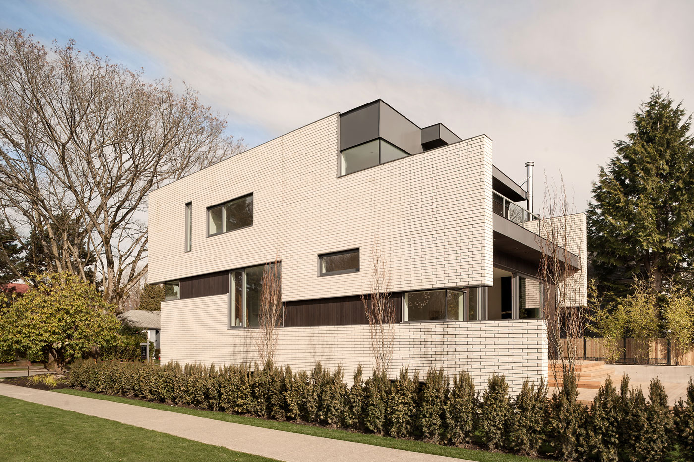 A Stylish Home with White Brick Facade and Full of Light in Vancouver, Canada by Randy Bens Architect (2)