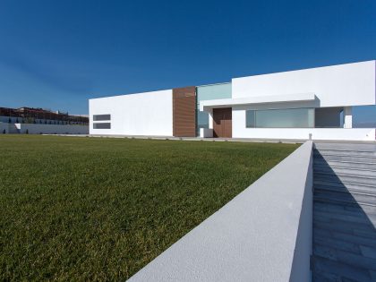 A Stylish and Bright L-Shaped Home with Playful Interiors in Crete, Greece by 3+ architecture (2)