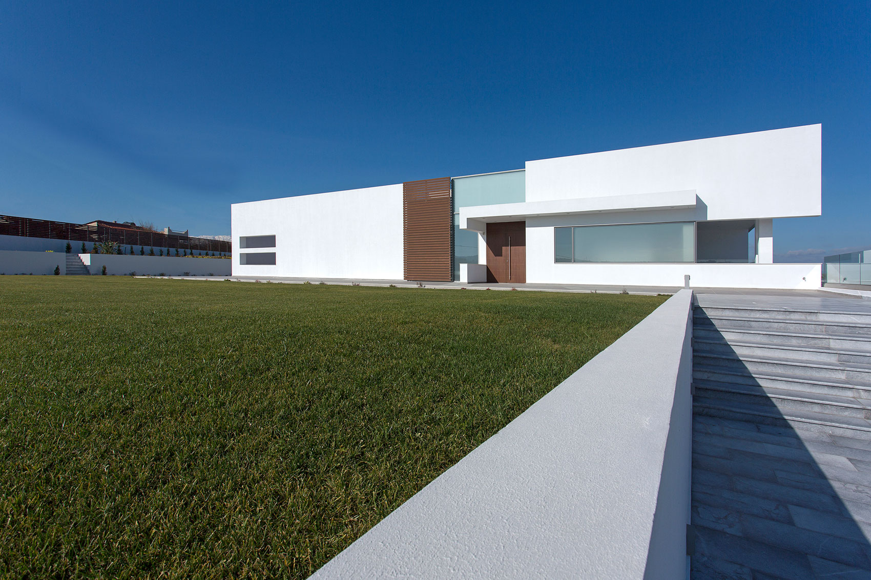 A Stylish and Bright L-Shaped Home with Playful Interiors in Crete, Greece by 3+ architecture (2)