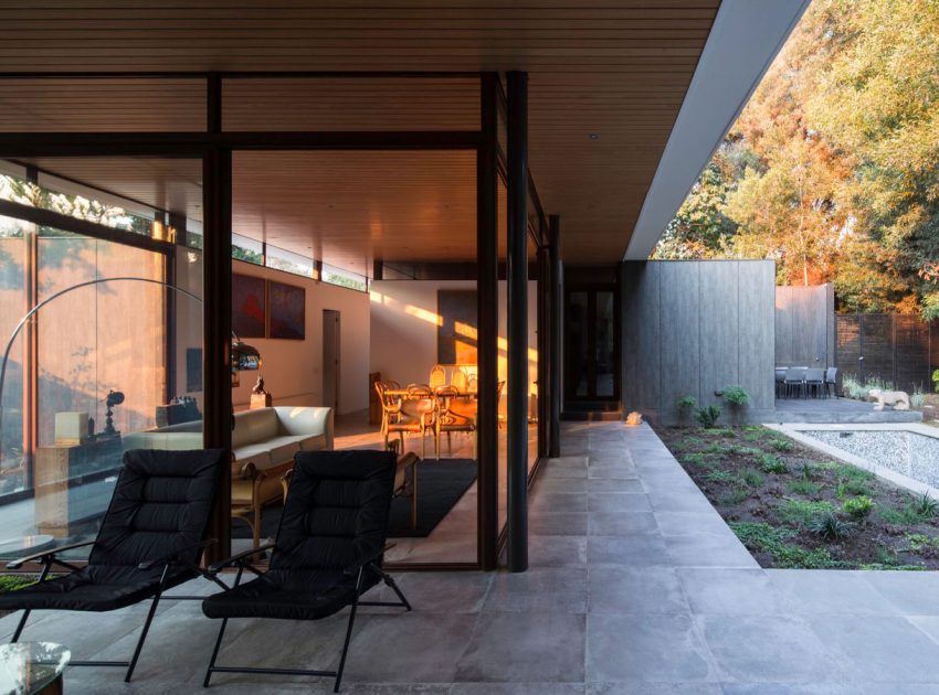 A Unique and Cozy House Combines Metal, Concrete and Plenty of Glass in Las Condes, Chile by Iglesis Arquitectos (4)