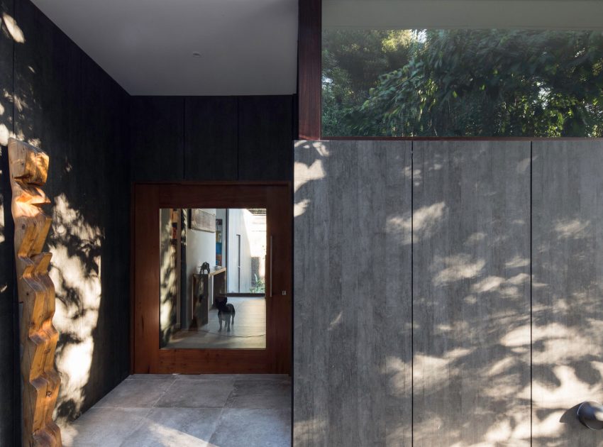 A Unique and Cozy House Combines Metal, Concrete and Plenty of Glass in Las Condes, Chile by Iglesis Arquitectos (7)