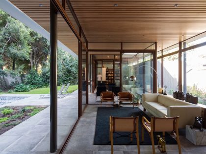 A Unique and Cozy House Combines Metal, Concrete and Plenty of Glass in Las Condes, Chile by Iglesis Arquitectos (9)