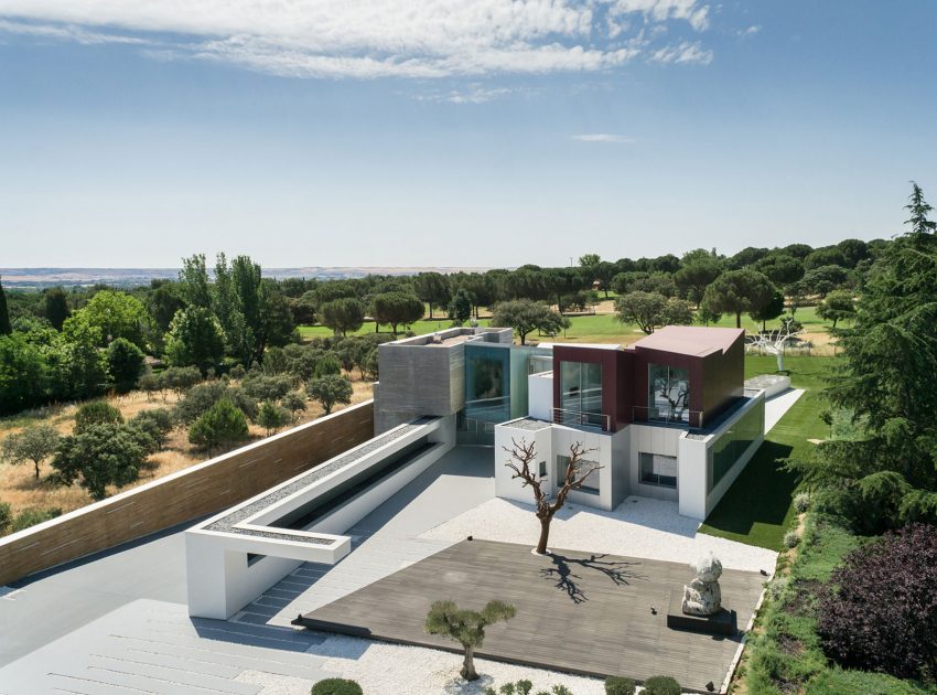 An Eco-Friendly Modern Home with Stunning and Asymmetrical Exterior in Madrid, Spain by ABIBOO Architecture (11)