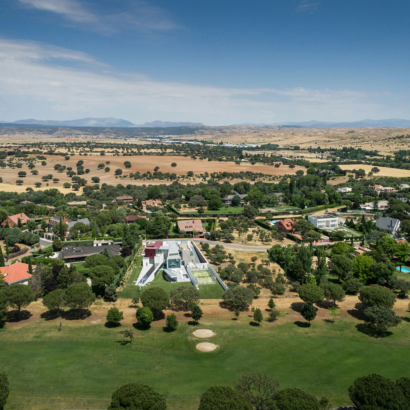 An Eco-Friendly Modern Home with Stunning and Asymmetrical Exterior in Madrid, Spain by ABIBOO Architecture (8)