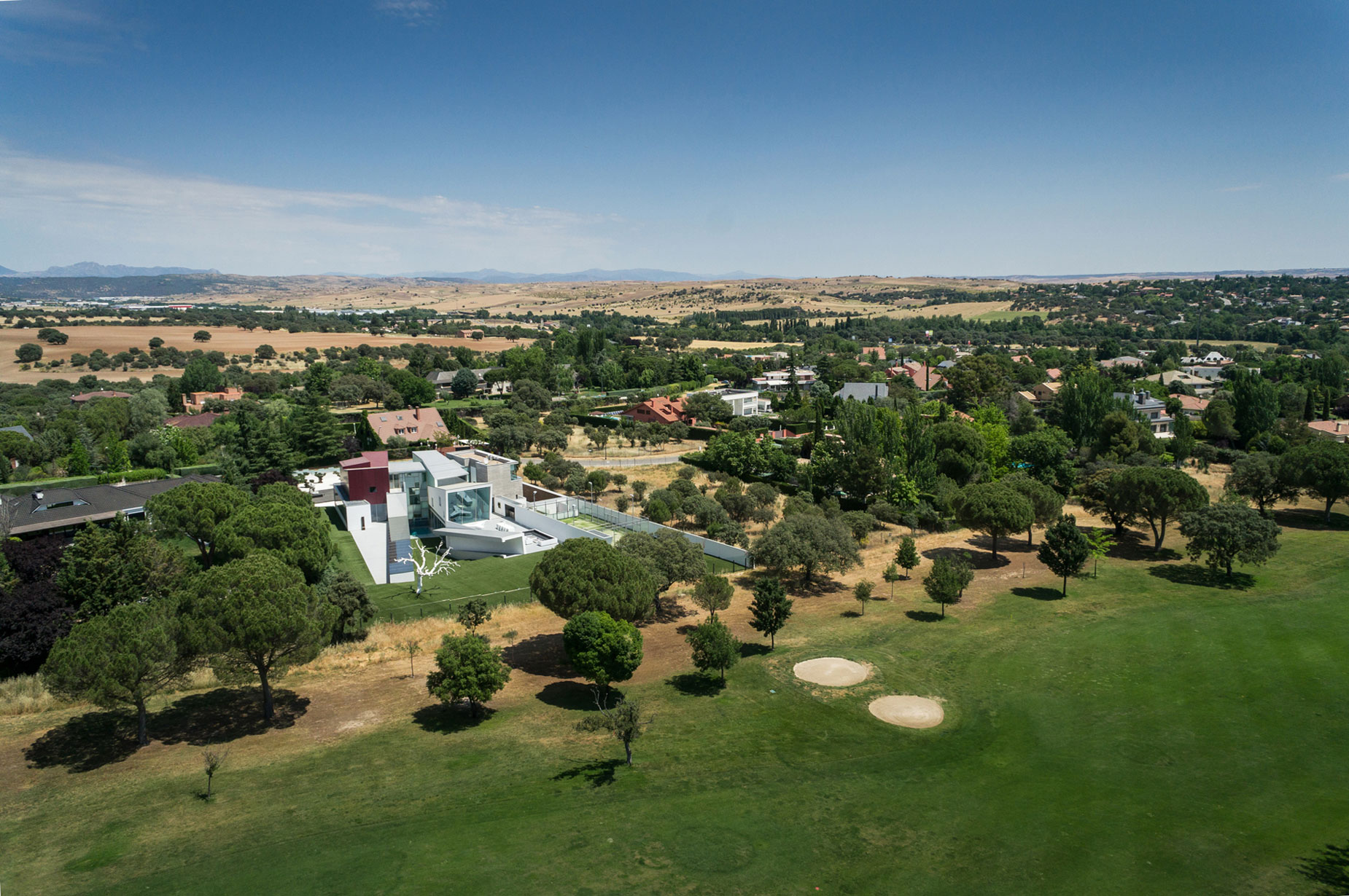 An Eco-Friendly Modern Home with Stunning and Asymmetrical Exterior in Madrid, Spain by ABIBOO Architecture (9)