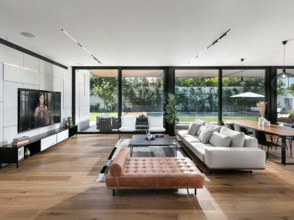 A Brutalist Yet Warm Modern Home with Artistic Touches in Sharon, Israel by Apple Architects (3)