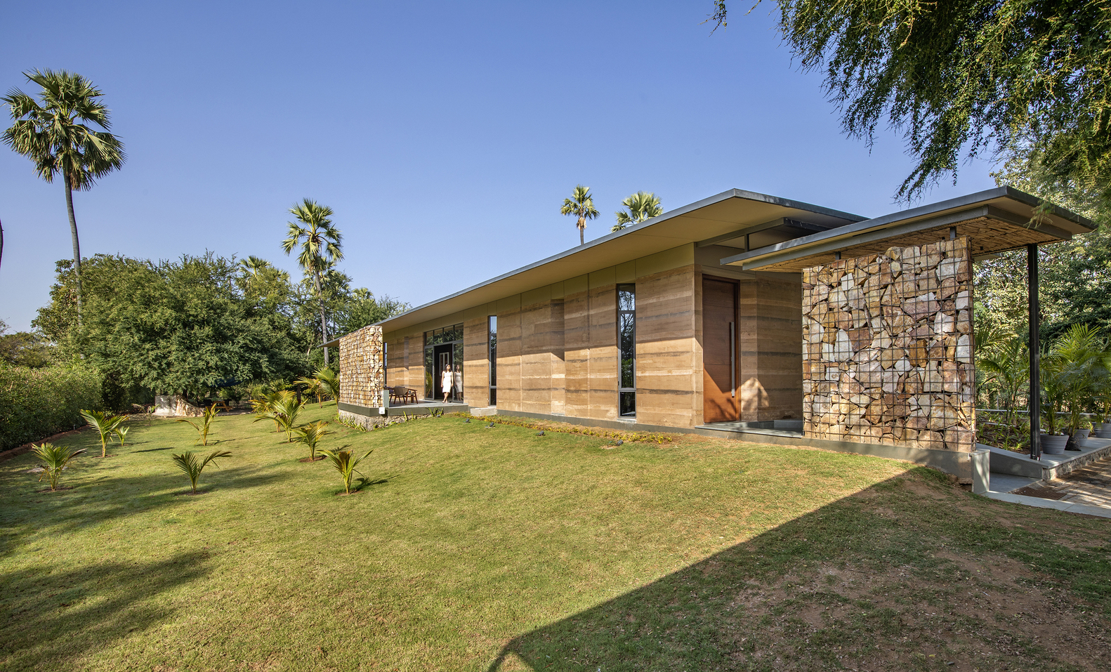 Art and Architecture Associates Design a Modern Rammed Earth Home in Vadodara, India (1)