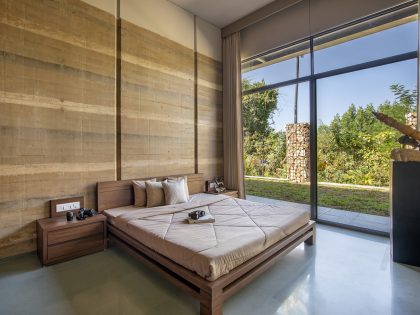 Art and Architecture Associates Design a Modern Rammed Earth Home in Vadodara, India (15)