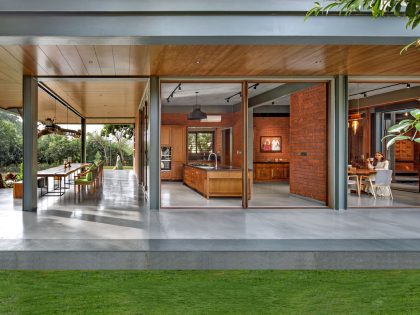 A Beautiful House with Mix of Wood, Metal and Brick, with Earthy Tones in Bharuch, India by Dipen Gada and Associates (28)