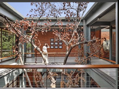 A Beautiful House with Mix of Wood, Metal and Brick, with Earthy Tones in Bharuch, India by Dipen Gada and Associates (38)