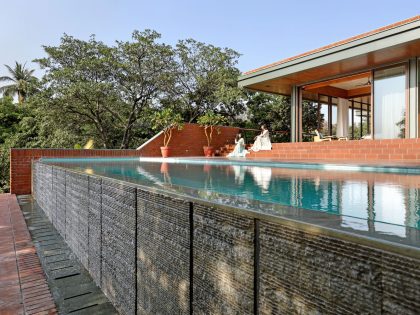 A Beautiful House with Mix of Wood, Metal and Brick, with Earthy Tones in Bharuch, India by Dipen Gada and Associates (45)