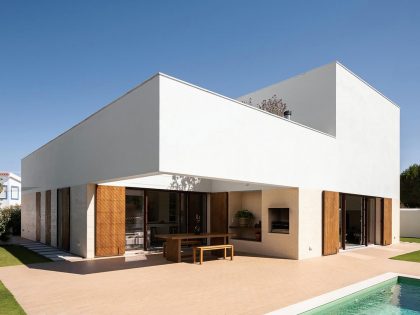 A Bright and Elegant Geometric House for Two Families in Comporta, Portugal by Estúdio AMATAM (1)