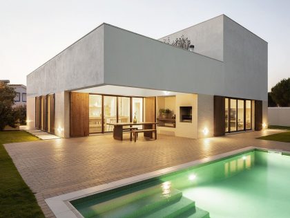 A Bright and Elegant Geometric House for Two Families in Comporta, Portugal by Estúdio AMATAM (20)