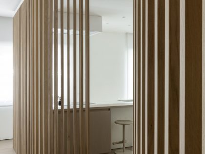 A Contemporary Apartment with a Variety of Wood Partition Walls in Rome, Italy by Filippo Bombace (10)