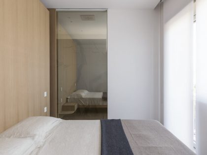 A Contemporary Apartment with a Variety of Wood Partition Walls in Rome, Italy by Filippo Bombace (14)