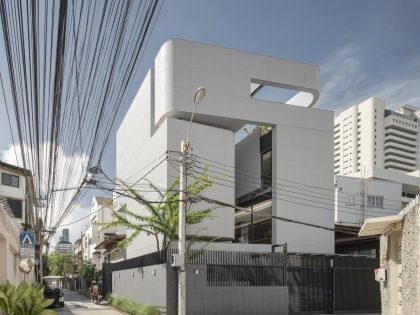 A Contemporary House Made of Wood, Concrete, Steel, Glass and Stone in Bangkok, Thailand by Kuanchanok Pakavaleetorn Architects (1)