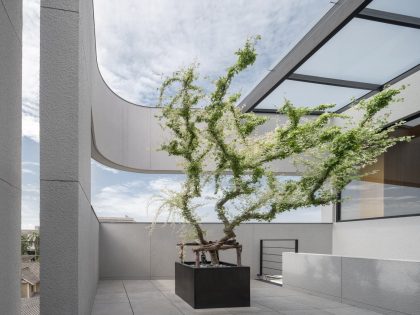 A Contemporary House Made of Wood, Concrete, Steel, Glass and Stone in Bangkok, Thailand by Kuanchanok Pakavaleetorn Architects (20)