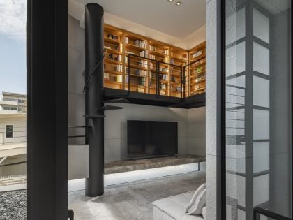 A Contemporary House Made of Wood, Concrete, Steel, Glass and Stone in Bangkok, Thailand by Kuanchanok Pakavaleetorn Architects (4)