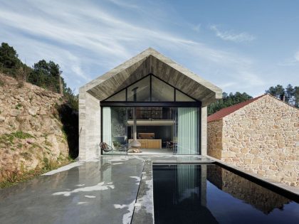 A Contemporary House Perched on a Bluff and Surrounded by Dense Pine Forests in Guarda, Portugal by Filipe Pina + David Bilo (1)