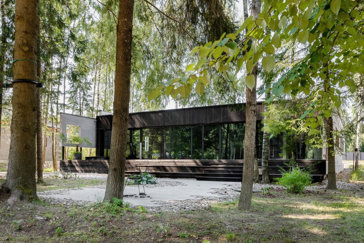A House with Monochrome Interiors and an Unusual Facade in Minsk, Belarus by Zrobim Architects (1)