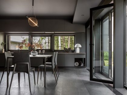 A House with Monochrome Interiors and an Unusual Facade in Minsk, Belarus by Zrobim Architects (11)