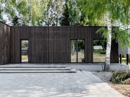 A House with Monochrome Interiors and an Unusual Facade in Minsk, Belarus by Zrobim Architects (2)