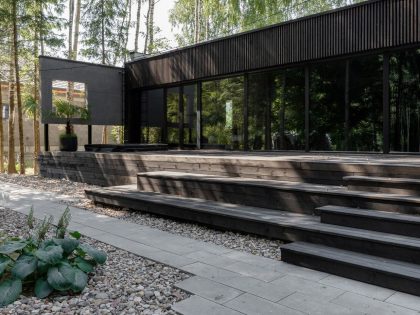 A House with Monochrome Interiors and an Unusual Facade in Minsk, Belarus by Zrobim Architects (24)