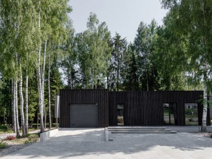 A House with Monochrome Interiors and an Unusual Facade in Minsk, Belarus by Zrobim Architects (25)