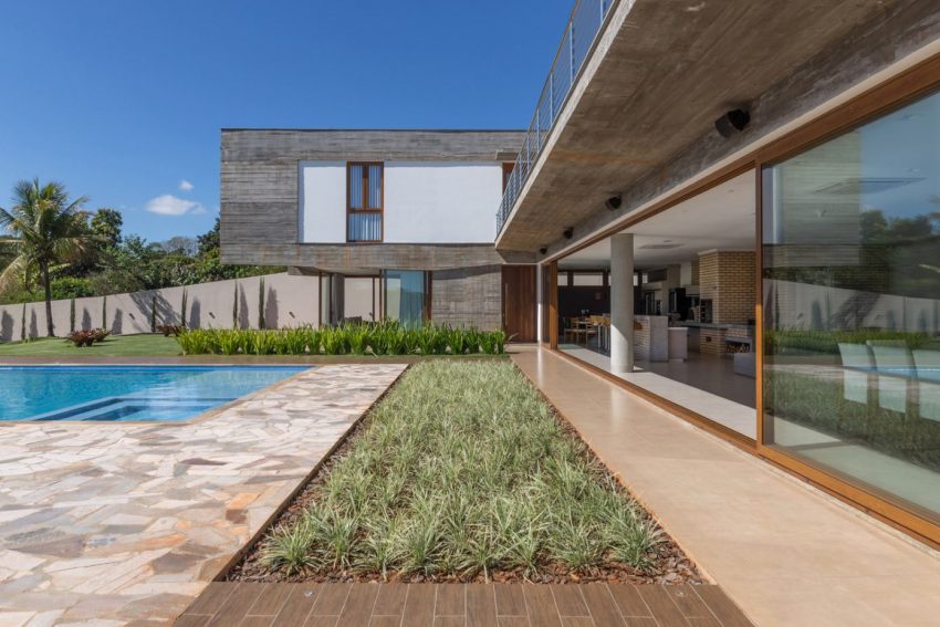 A Modern House with a Palette of Wood, Concrete, Stone and Steel in Maringá, Brazil by Grupo Pr (7)