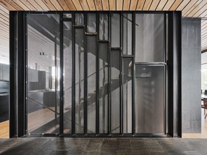 A Mountain Home Features Poured-in-Place Concrete with an Imposing Steel Tower in Truckee, California by Olson Kundig (16)