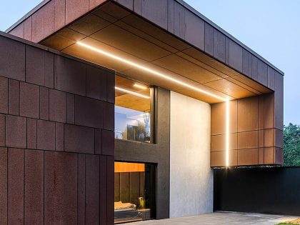 A Sophisticated House Made Of Corten, Wood and Concrete in Tuscany, Italy by Reform Architekt (17)
