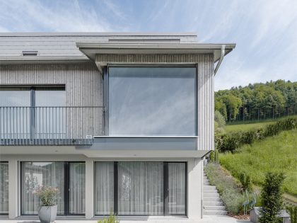 A Spacious Modern House with a Wooden Facade in Dättlikon, Switzerland by Skarka Studios (1)