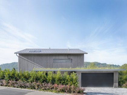 A Spacious Modern House with a Wooden Facade in Dättlikon, Switzerland by Skarka Studios (13)