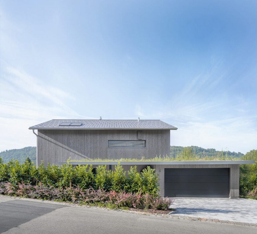 A Spacious Modern House with a Wooden Facade in Dättlikon, Switzerland by Skarka Studios (13)