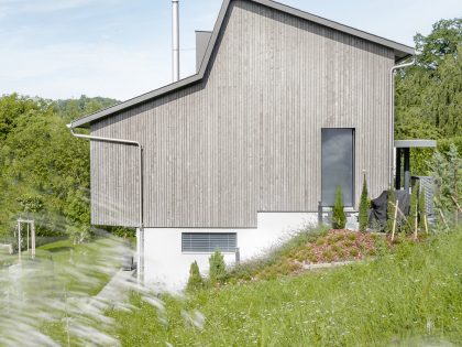 A Spacious Modern House with a Wooden Facade in Dättlikon, Switzerland by Skarka Studios (14)