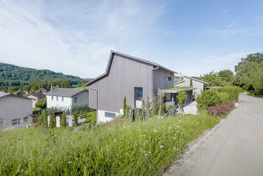 A Spacious Modern House with a Wooden Facade in Dättlikon, Switzerland by Skarka Studios (15)