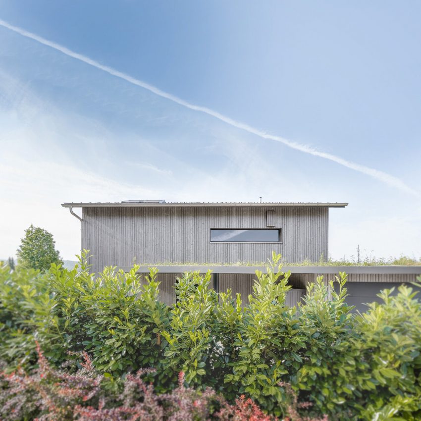 A Spacious Modern House with a Wooden Facade in Dättlikon, Switzerland by Skarka Studios (17)