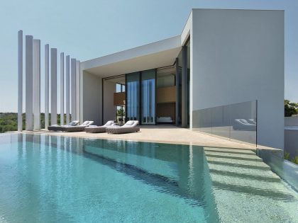 A Striking Contemporary Home with a Fish Tank Swimming Pool in Alicante, Spain by Monica Armani (2)