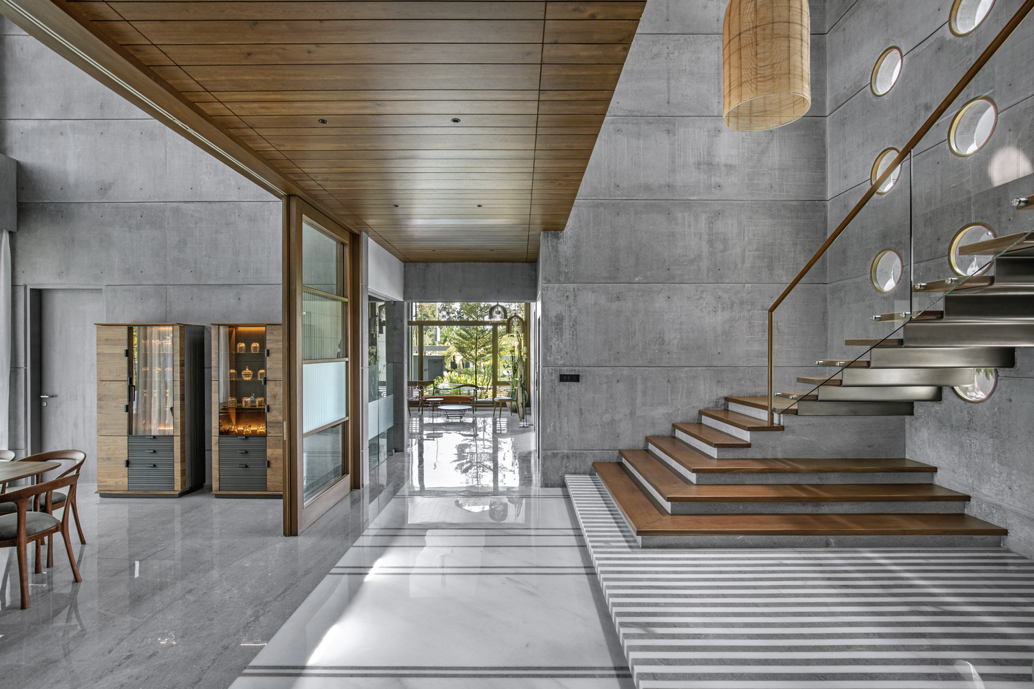 A Stunning House of Folded Concrete and Wooden Louvers in Vadodara, India by Dipen Gada and Associates (10)