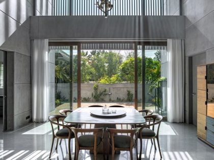 A Stunning House of Folded Concrete and Wooden Louvers in Vadodara, India by Dipen Gada and Associates (12)