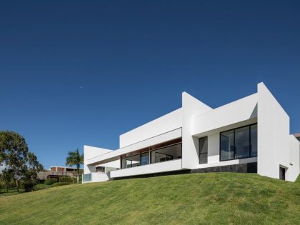 NEBR Arquitetura Designs a Stylish Contemporary House Set Amidst the Scenic Rocky Lands of Gravatá, Brazil (1)