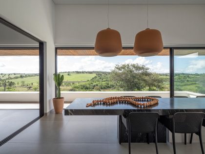 NEBR Arquitetura Designs a Stylish Contemporary House Set Amidst the Scenic Rocky Lands of Gravatá, Brazil (11)