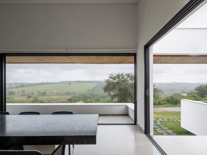 NEBR Arquitetura Designs a Stylish Contemporary House Set Amidst the Scenic Rocky Lands of Gravatá, Brazil (13)