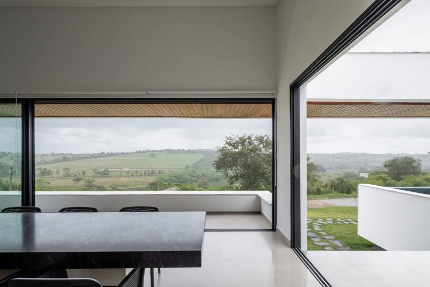 NEBR Arquitetura Designs a Stylish Contemporary House Set Amidst the Scenic Rocky Lands of Gravatá, Brazil (13)