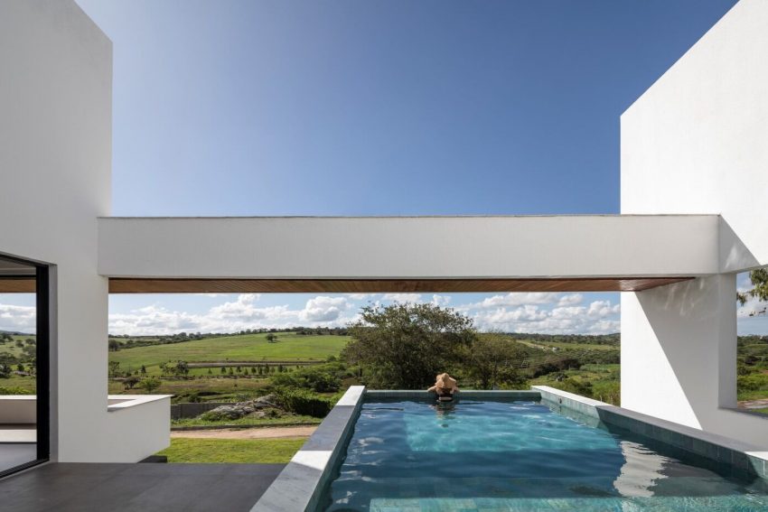 NEBR Arquitetura Designs a Stylish Contemporary House Set Amidst the Scenic Rocky Lands of Gravatá, Brazil (4)