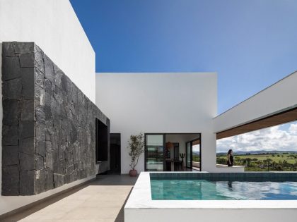 NEBR Arquitetura Designs a Stylish Contemporary House Set Amidst the Scenic Rocky Lands of Gravatá, Brazil (5)