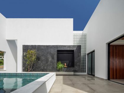 NEBR Arquitetura Designs a Stylish Contemporary House Set Amidst the Scenic Rocky Lands of Gravatá, Brazil (6)